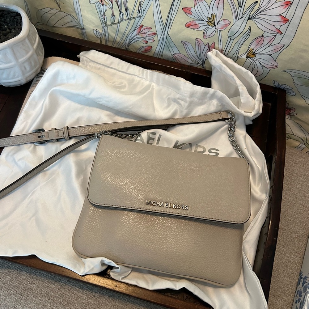 Michael Kors Light Gray Crossbody Bag and wallet.